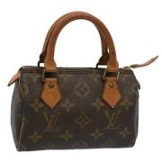 Pre-owned Brunt lerret Louis Vuitton Speedy