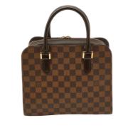 Pre-owned Brunbelagt lerret Louis Vuitton Triana