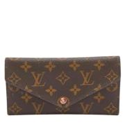 Pre-owned Brunt belagt lerret Louis Vuitton lommebok