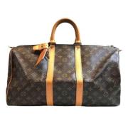 Pre-owned Brunt lerret Louis Vuitton Keepall