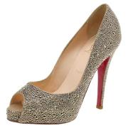 Pre-owned Gull semsket skinn Christian Louboutin haeler