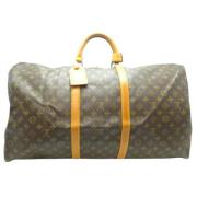 Pre-owned Brunt lerret Louis Vuitton Keepall