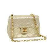 Pre-owned Gull stoff Chanel skulderveske