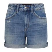 Blå denim shorts for damer med trendy touch