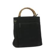 Pre-owned Suede handbags