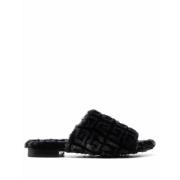 Svarte Shearling Slides med 4G Motiv