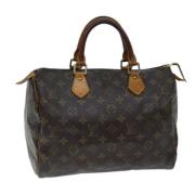 Pre-owned Canvas handbags