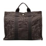 Pre-owned Canvas handbags