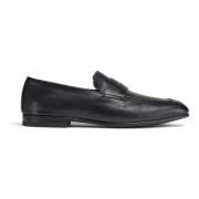 Klassiske svarte loafers