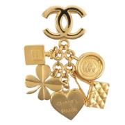 Pre-owned Metal brooches